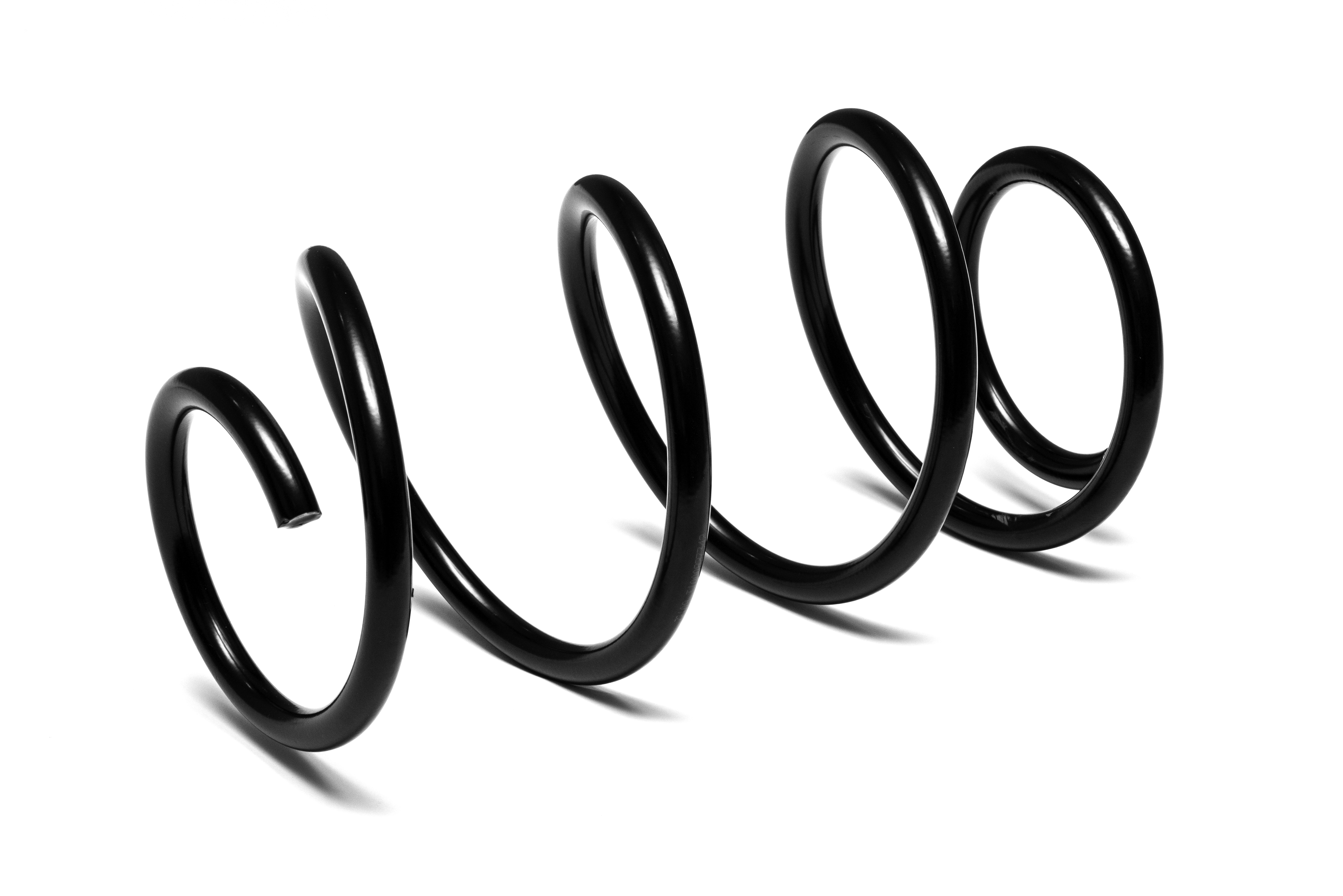 En sort spiralfjeder i vandret position mod en hvid baggrund, som kaster en skygge under sig.