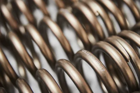 Compression springs for suspension systems.